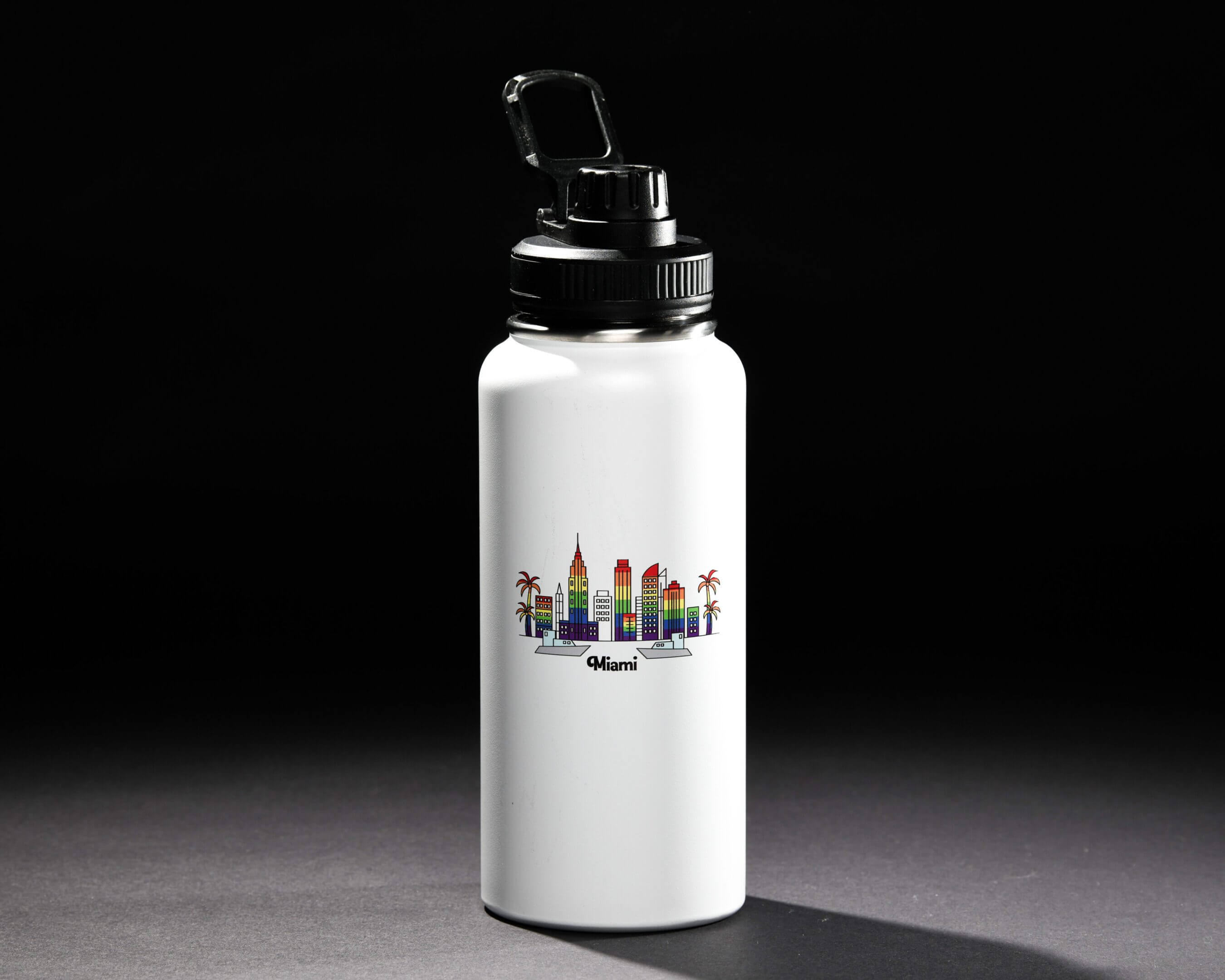 White water bottle with colorful city skyline illustration.