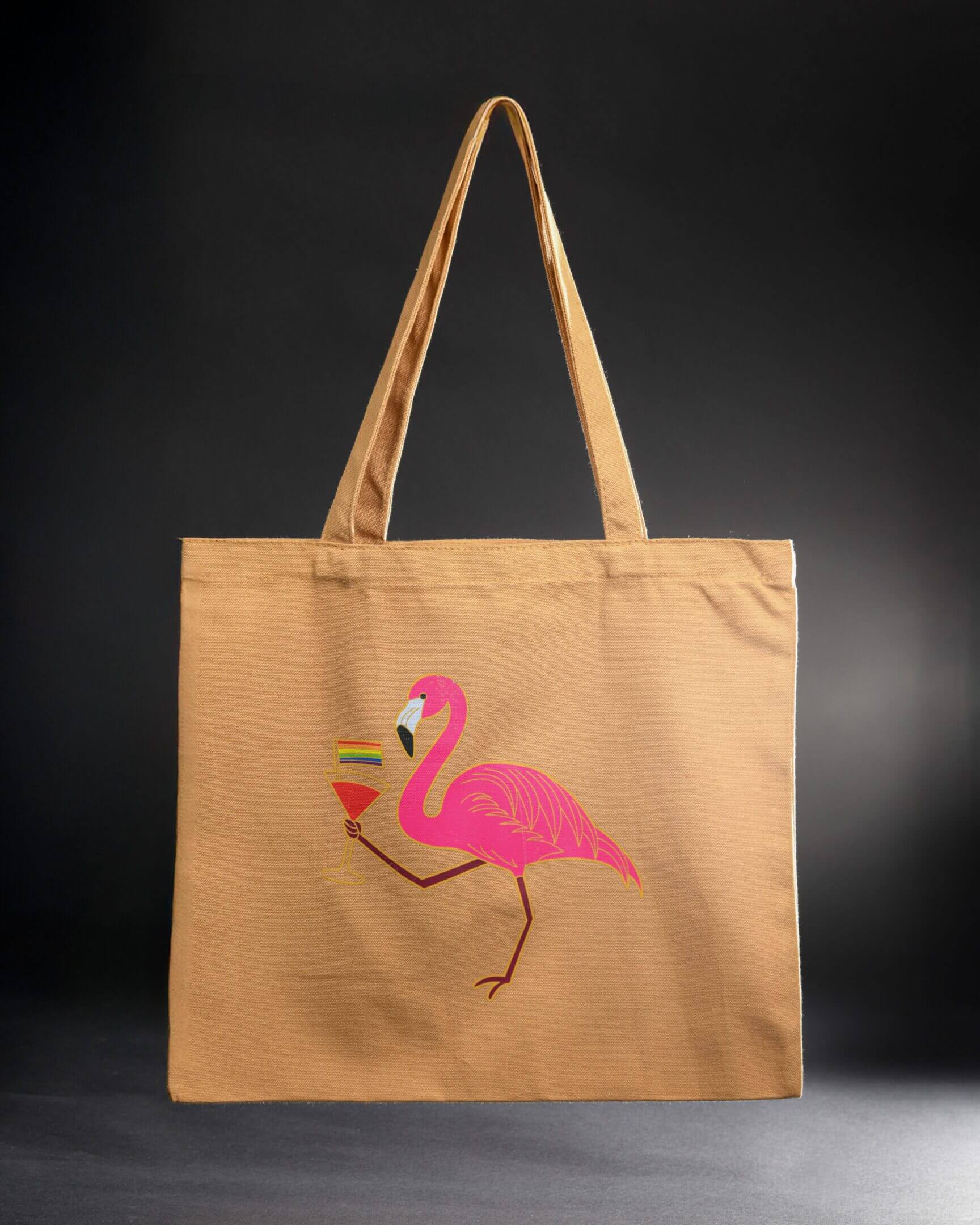 Brown tote bag with a pink flamingo design.