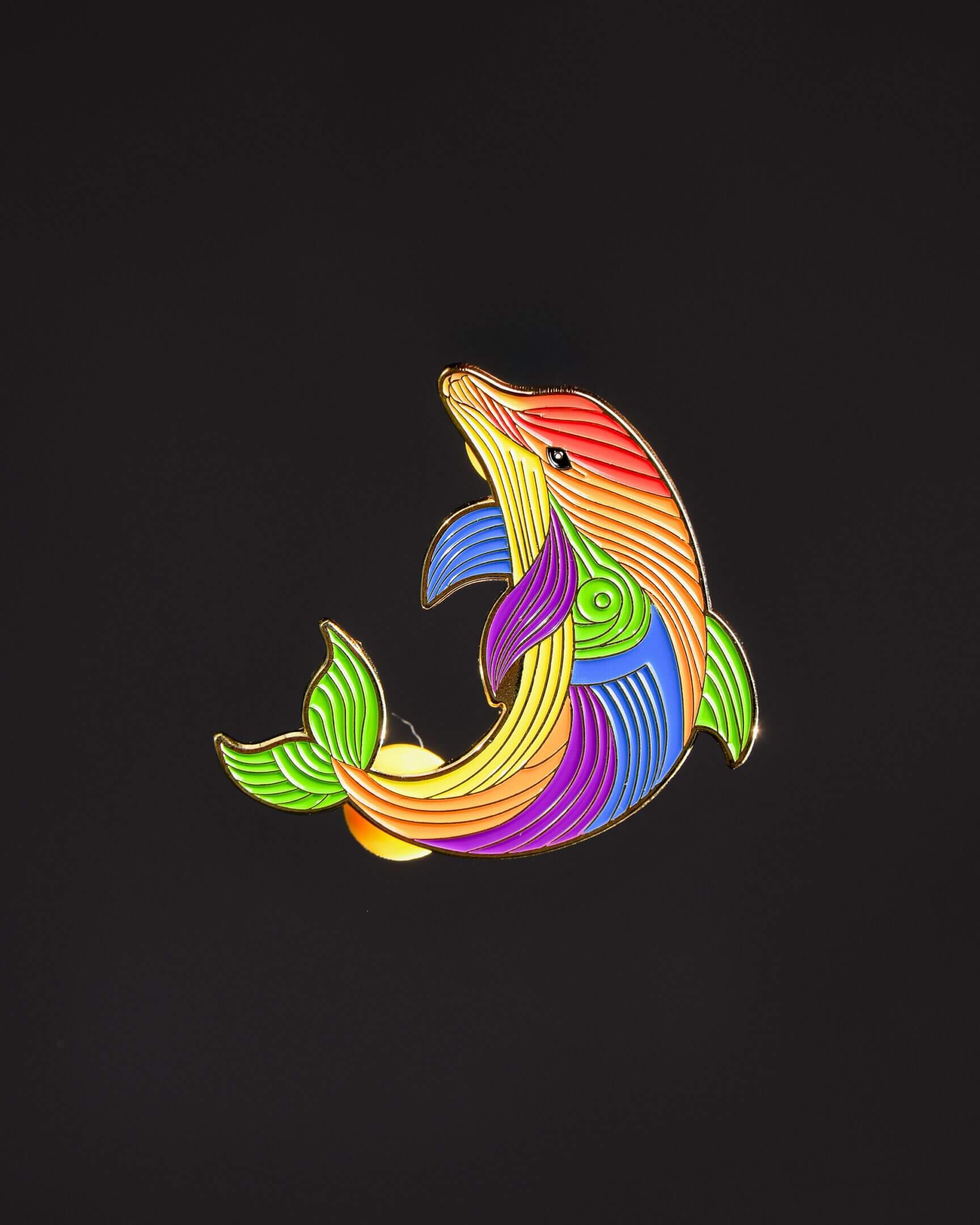 Colorful abstract dolphin on black background.