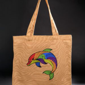 Beige tote bag with colorful dolphin design.