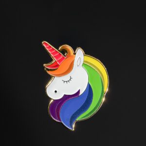 Unicorn pin with rainbow mane on black.