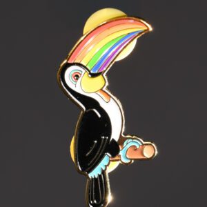 Toucan pin with a rainbow beak.